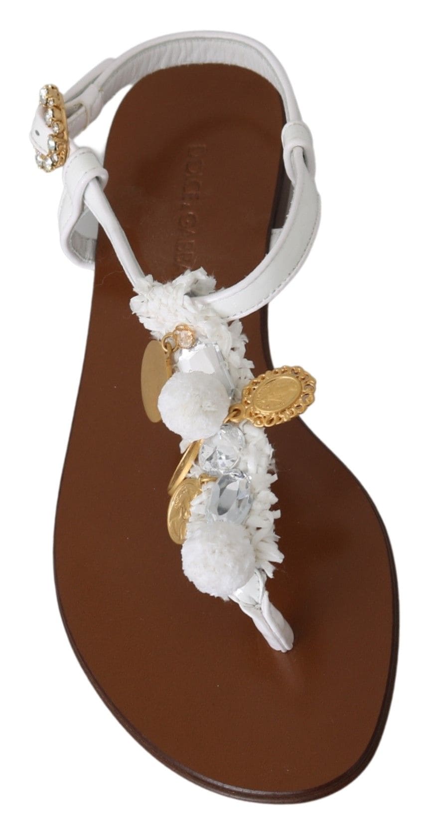 Chanclas planas con tiras en el tobillo y pompones de Dolce &amp; Gabbana