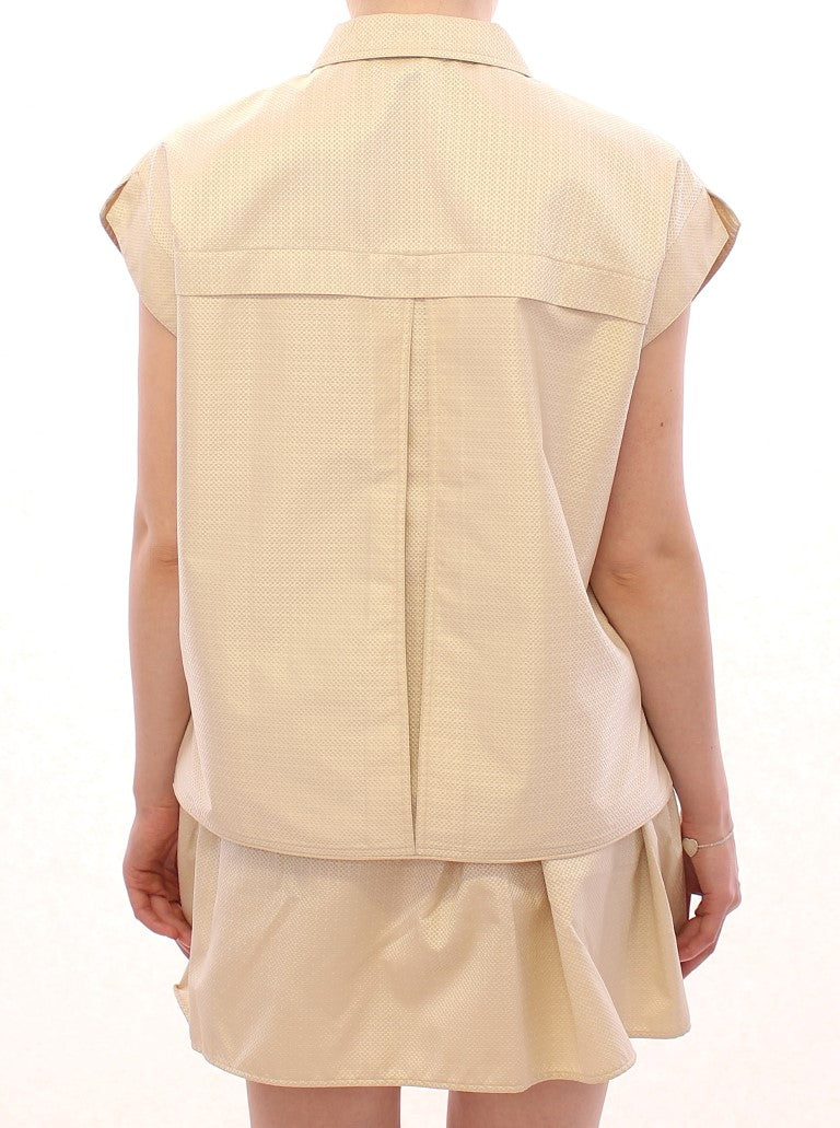 Blusa elegante sin mangas color beige de Andrea Incontri