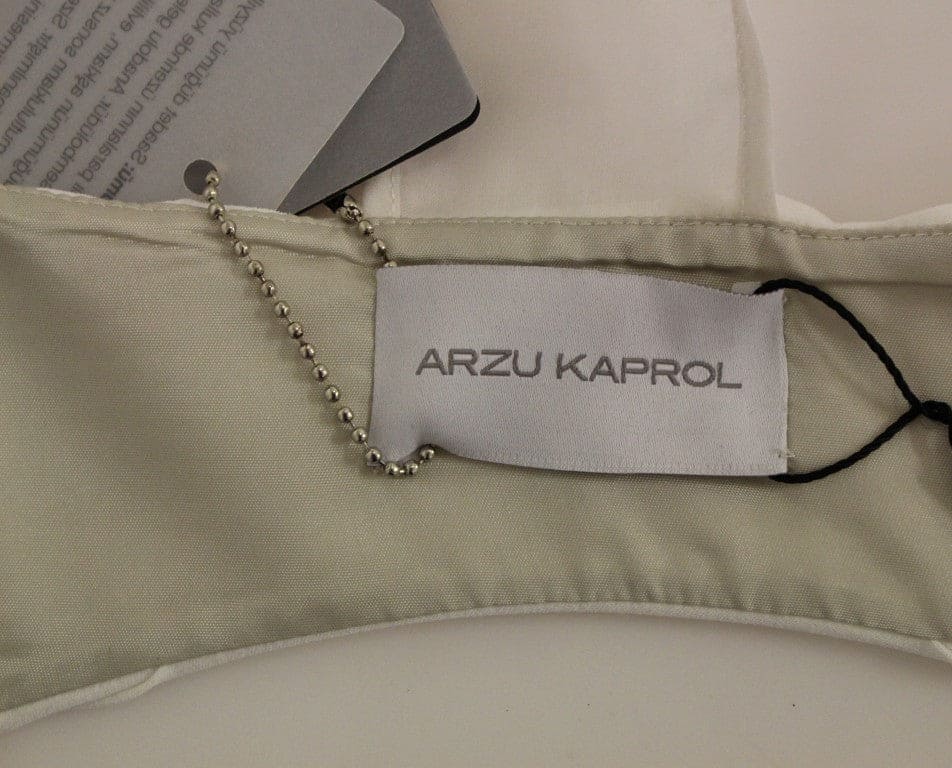 Chaleco elegante con espalda abierta y flecos de Arzu Kaprol