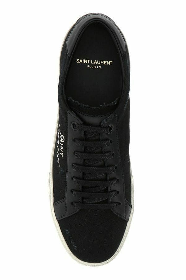 Zapatillas bajas elegantes de lona y piel en color negro de Saint Laurent