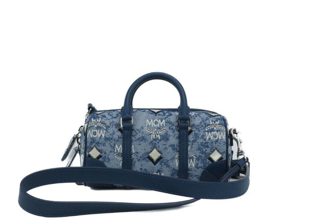 Bolso bandolera tipo cartera Boston Mini de MCM con logotipo en tela jacquard vintage en color azul