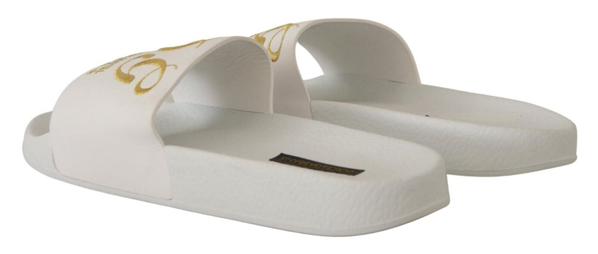 Sandalias elegantes de piel blanca con bordados dorados de Dolce &amp; Gabbana