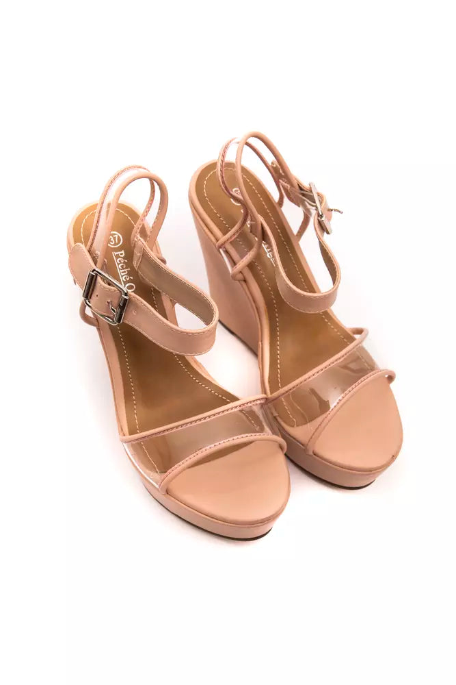 Sandalias de plataforma elevadas en color beige con banda transparente de Péché Originel