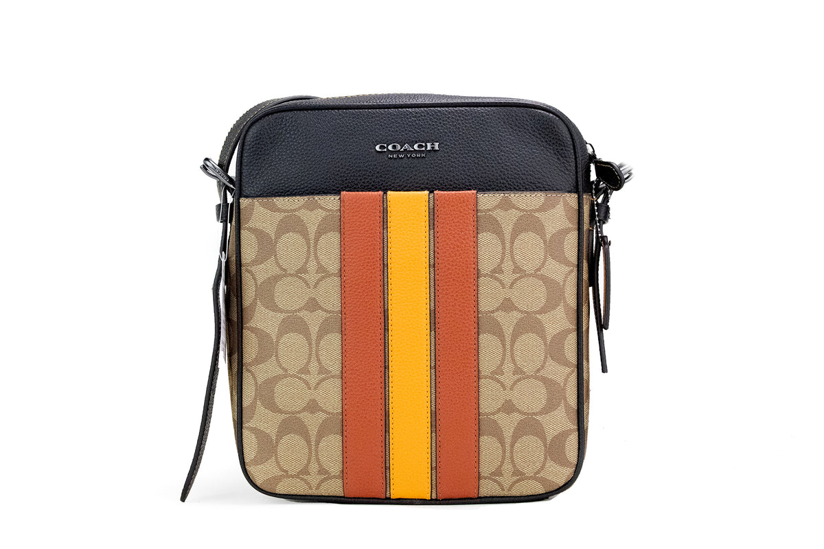 Bolso bandolera de lona revestida con rayas universitarias Hudson 21 Signature de COACH