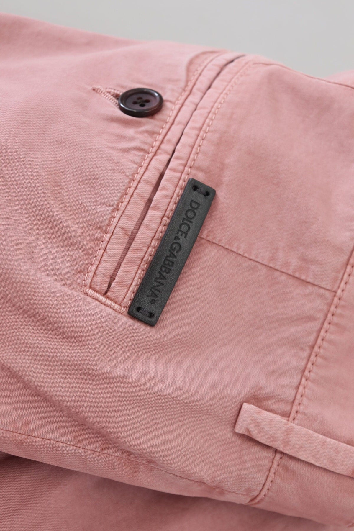 Pantalones cortos chinos rosados ​​exquisitos de Dolce &amp; Gabbana para hombre