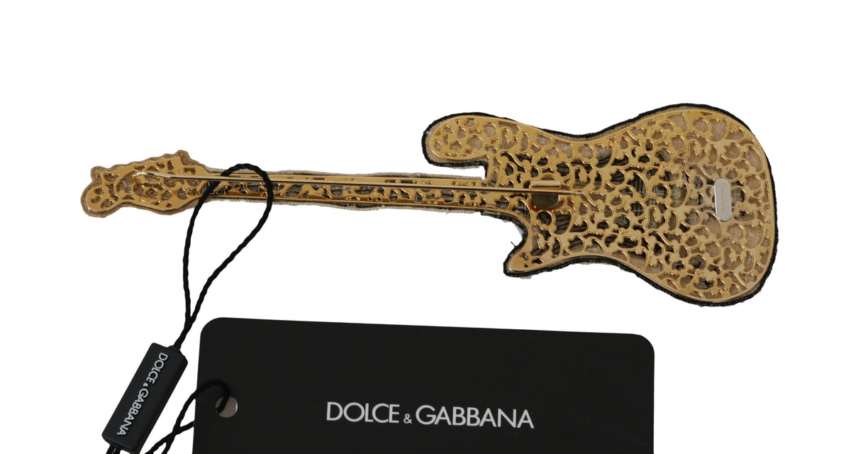 Broche con forma de guitarra y lentejuelas doradas de Dolce &amp; Gabbana