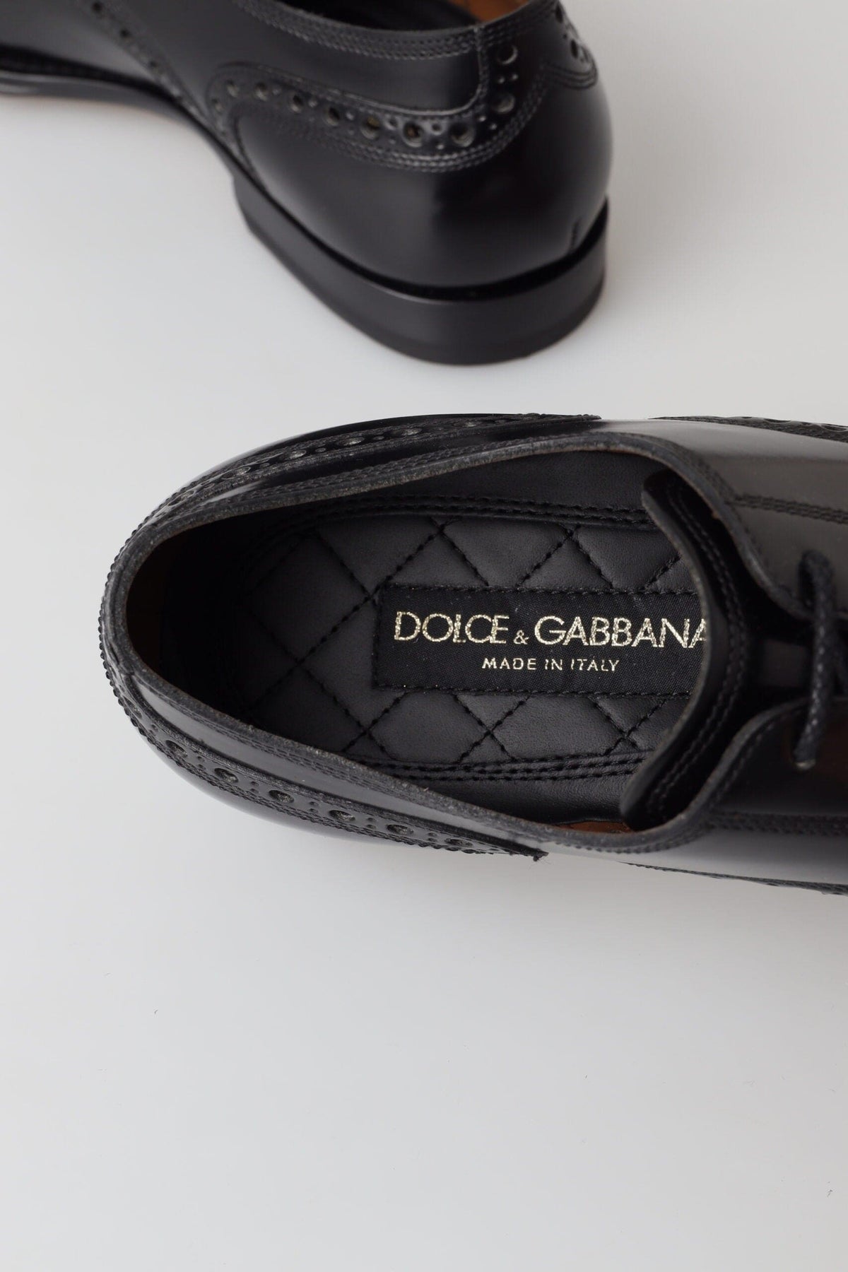 Zapatos elegantes de piel negra con puntera estilo oxford de Dolce &amp; Gabbana