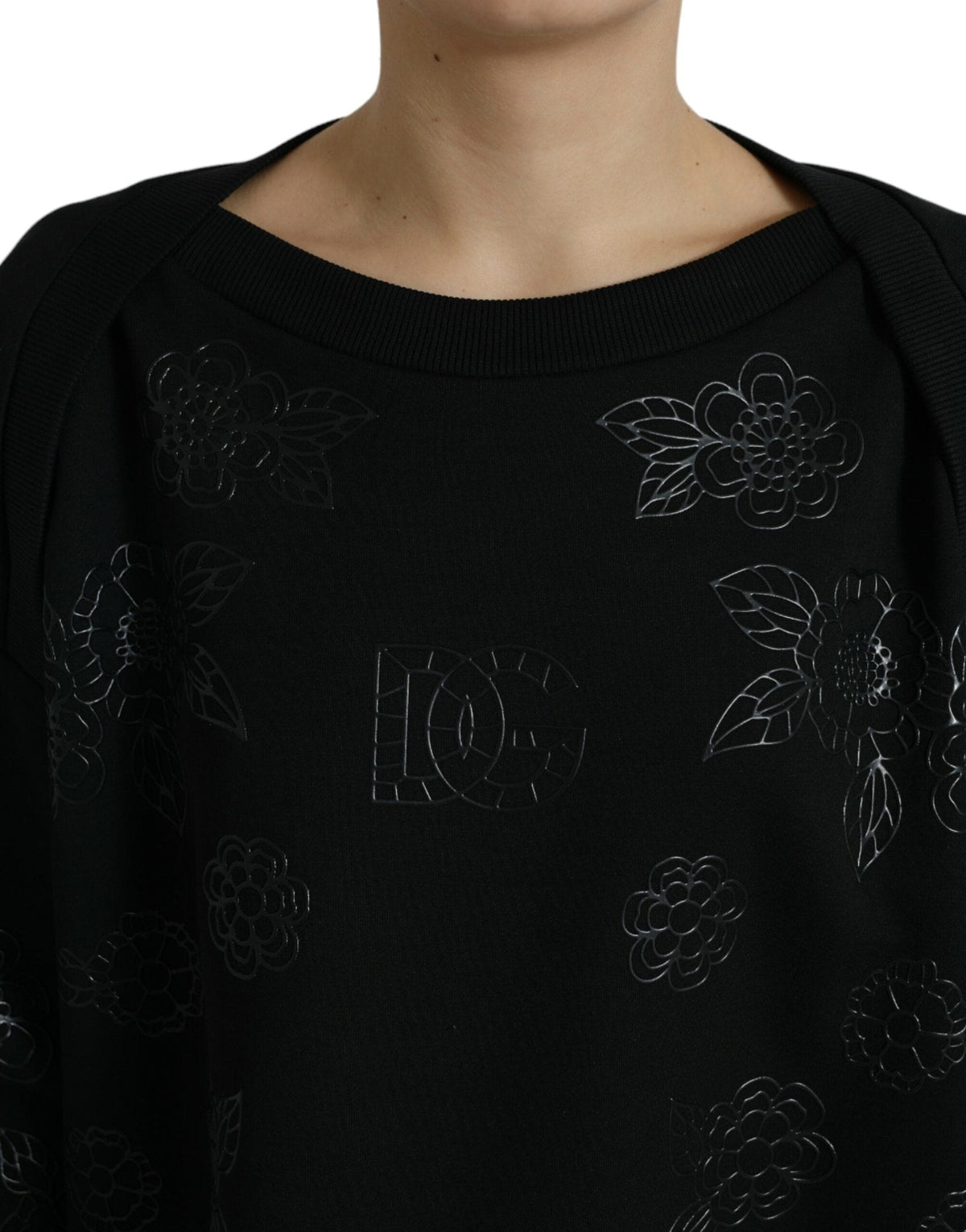 Pull élégant à appliqués floraux noirs Dolce &amp; Gabbana