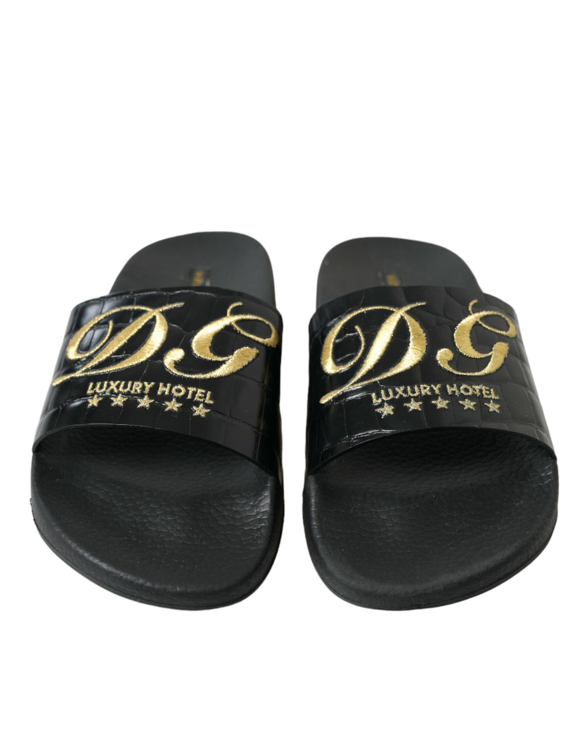 Sandalias elegantes de piel negra y dorada de Dolce &amp; Gabbana