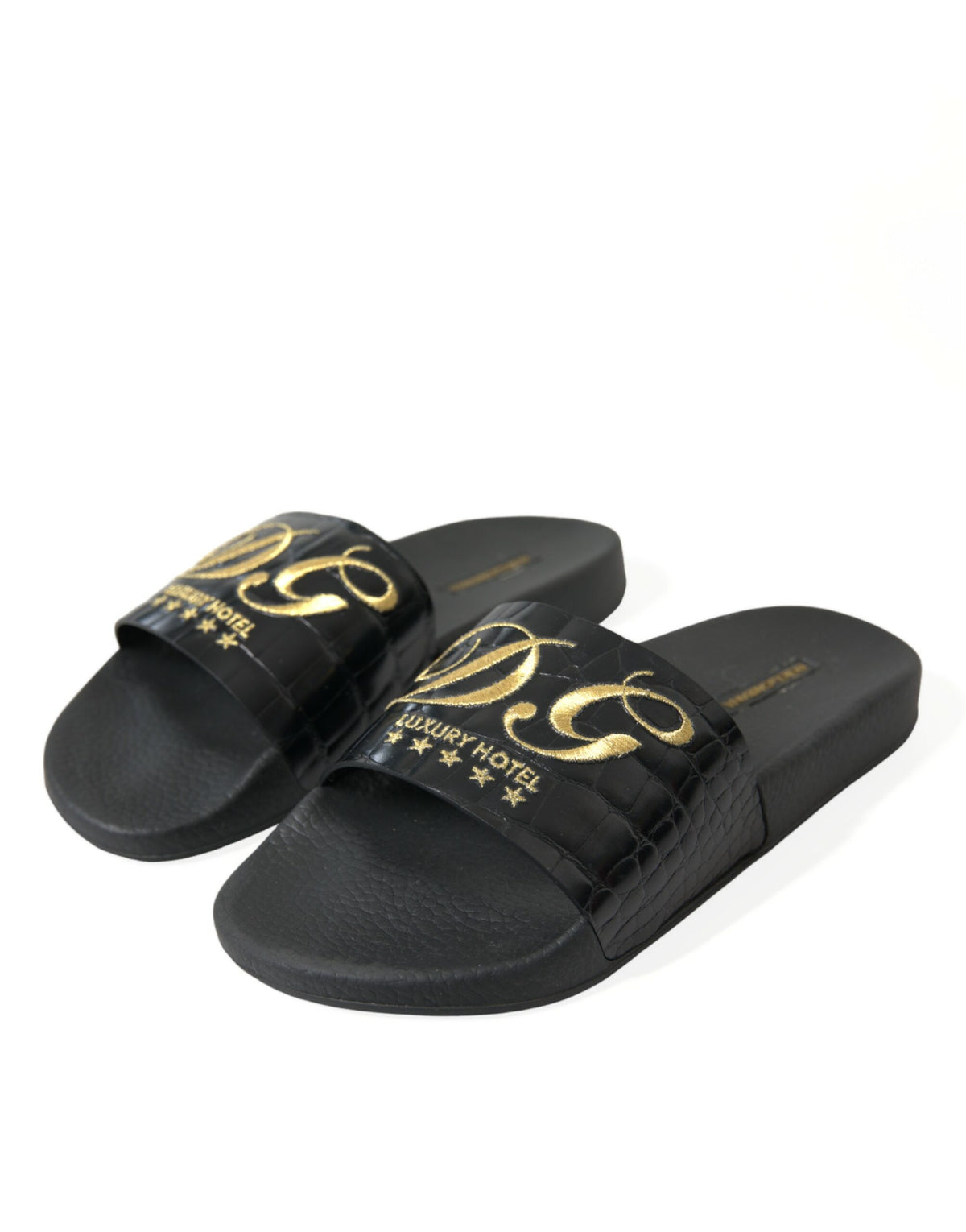 Sandalias elegantes de piel negra y dorada de Dolce &amp; Gabbana