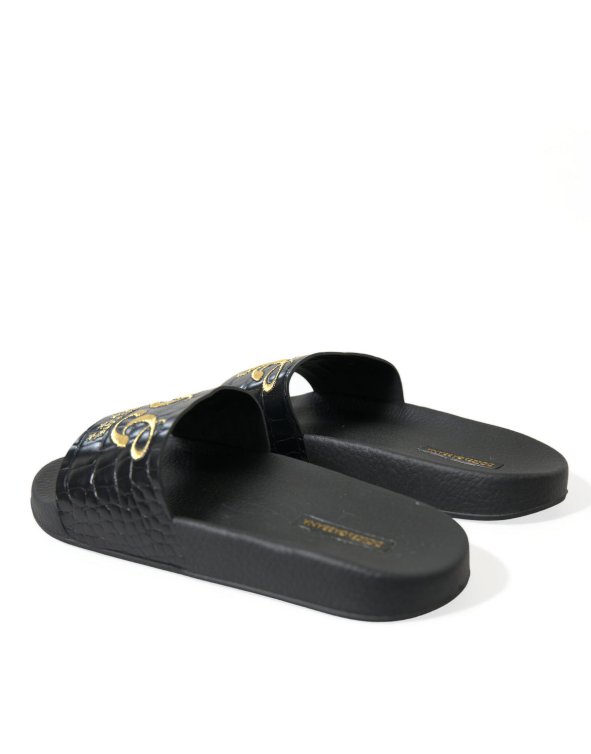 Sandalias elegantes de piel negra y dorada de Dolce &amp; Gabbana