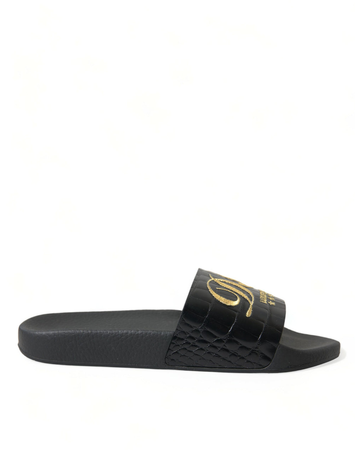 Sandalias elegantes de piel negra y dorada de Dolce &amp; Gabbana