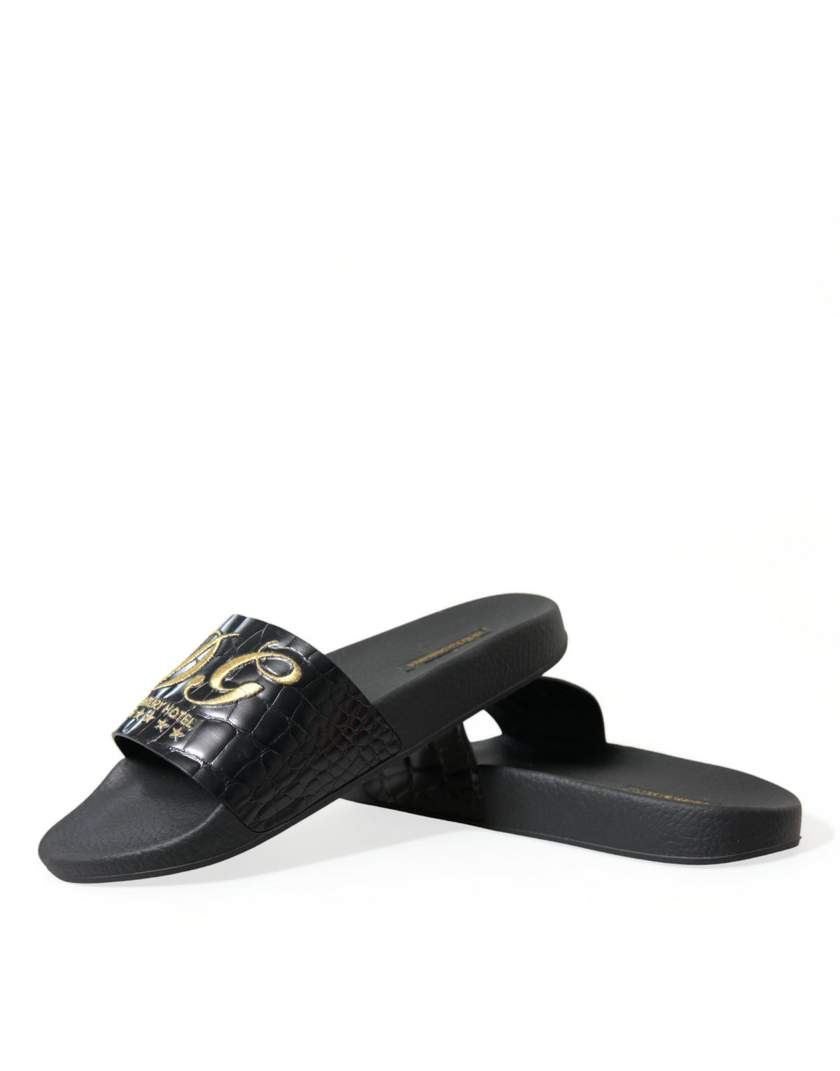 Sandalias elegantes de piel negra y dorada de Dolce &amp; Gabbana