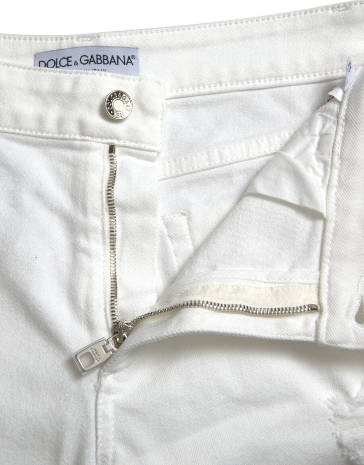 Elegantes jeans blancos de tiro medio con corte de mezclilla recortado de Dolce &amp; Gabbana