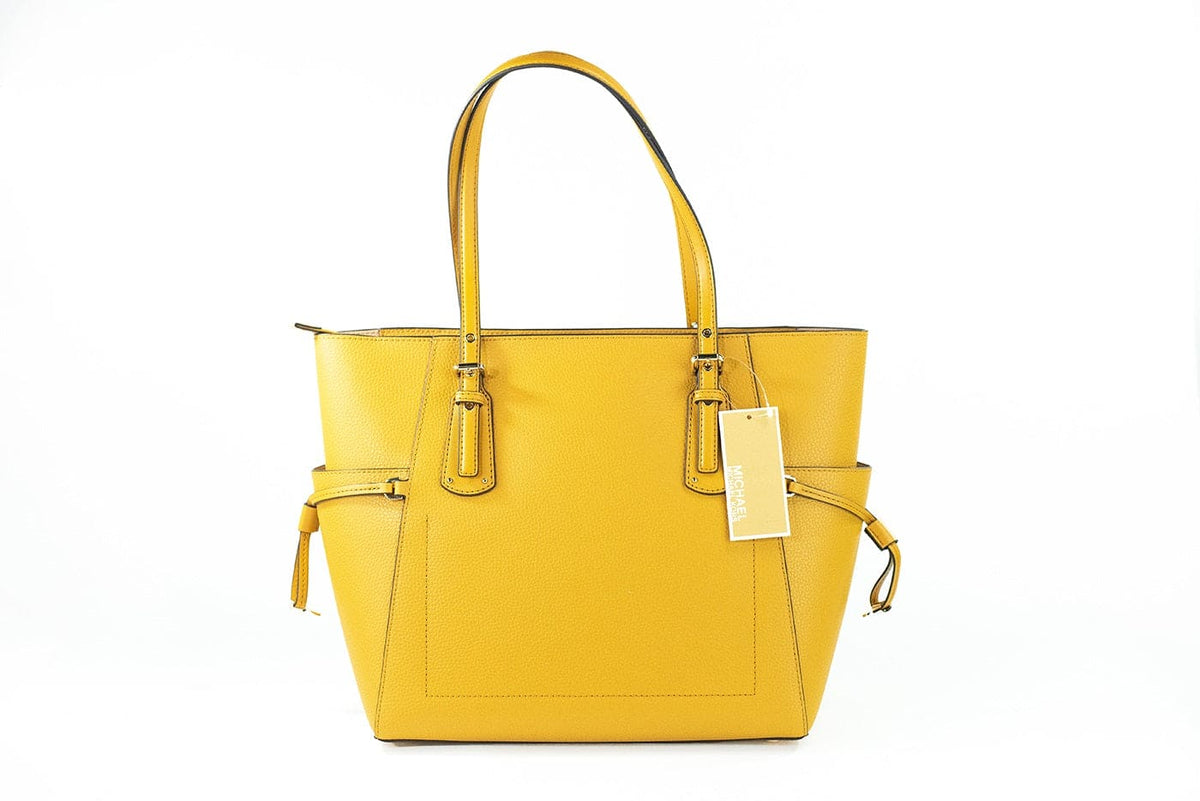 Bolso tote East West de piel granulada con diseño Marigold Voyager de Michael Kors