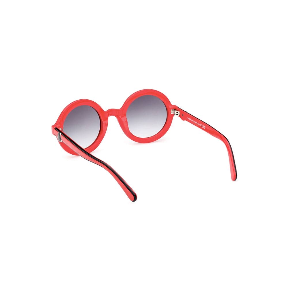 Lunettes de soleil Moncler Chic à verres ronds et détails contrastés