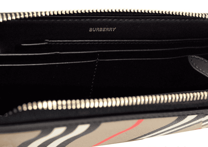 Portefeuille continental zippé en cuir noir et toile à rayures emblématiques Burberry Ellerby