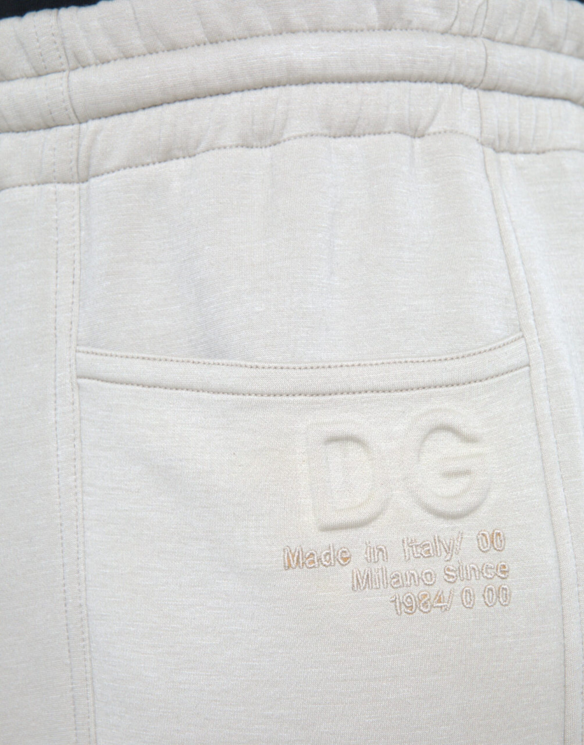 Pantalones deportivos cargo de viscosa Dolce &amp; Gabbana en color blanco roto