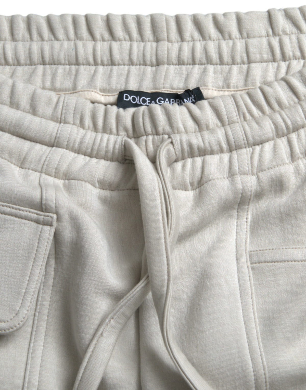 Pantalones deportivos cargo de viscosa Dolce &amp; Gabbana en color blanco roto