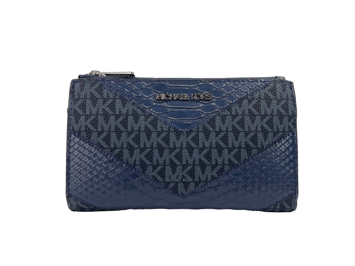 Cartera de mano grande Jet Set de Michael Kors con doble cremallera y diseño de serpiente en azul marino