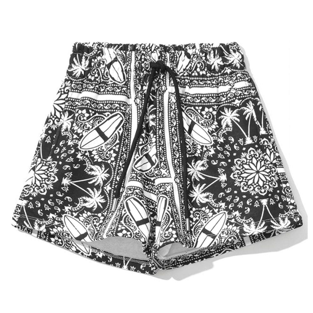 Short en coton monochrome à imprimé palmiers de Comme Des Fuckdown Chic