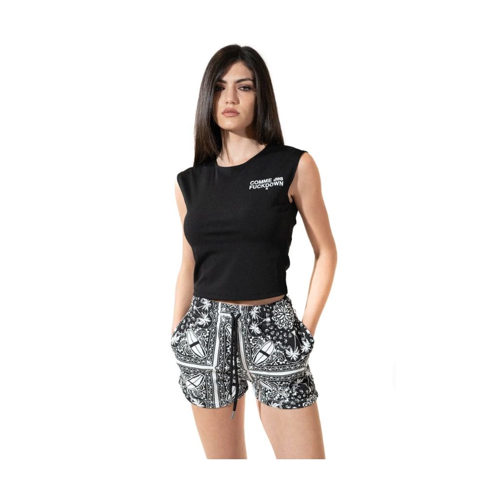 Short en coton monochrome à imprimé palmiers de Comme Des Fuckdown Chic