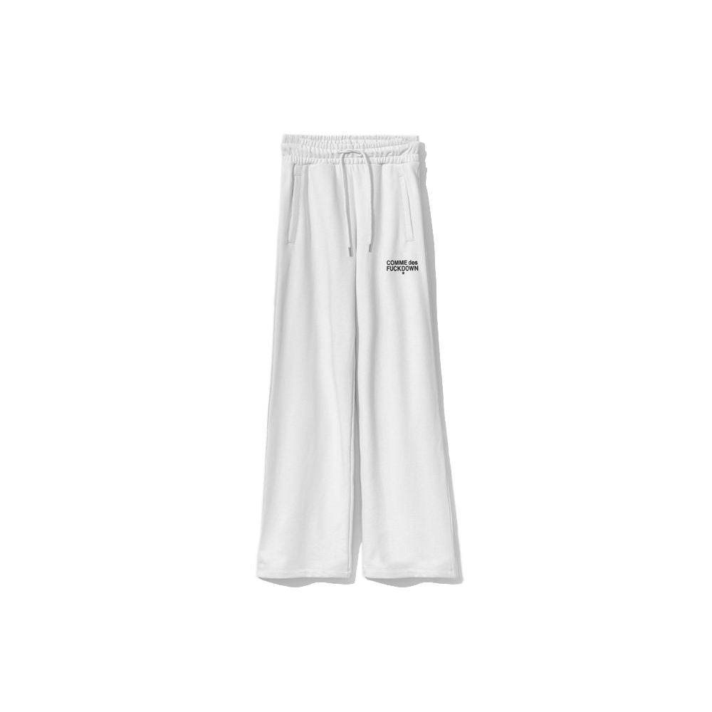 Pantalones deportivos blancos con el logo de Comme Des Fuckdown Chic