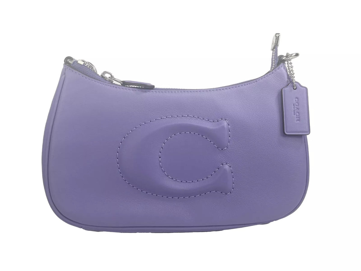 COACH Teri - Bolso bandolera de piel lisa en color morado