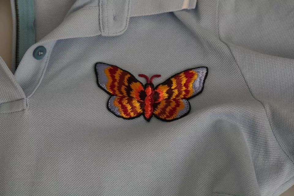 Camiseta polo de algodón con mariposas azules de Dolce &amp; Gabbana