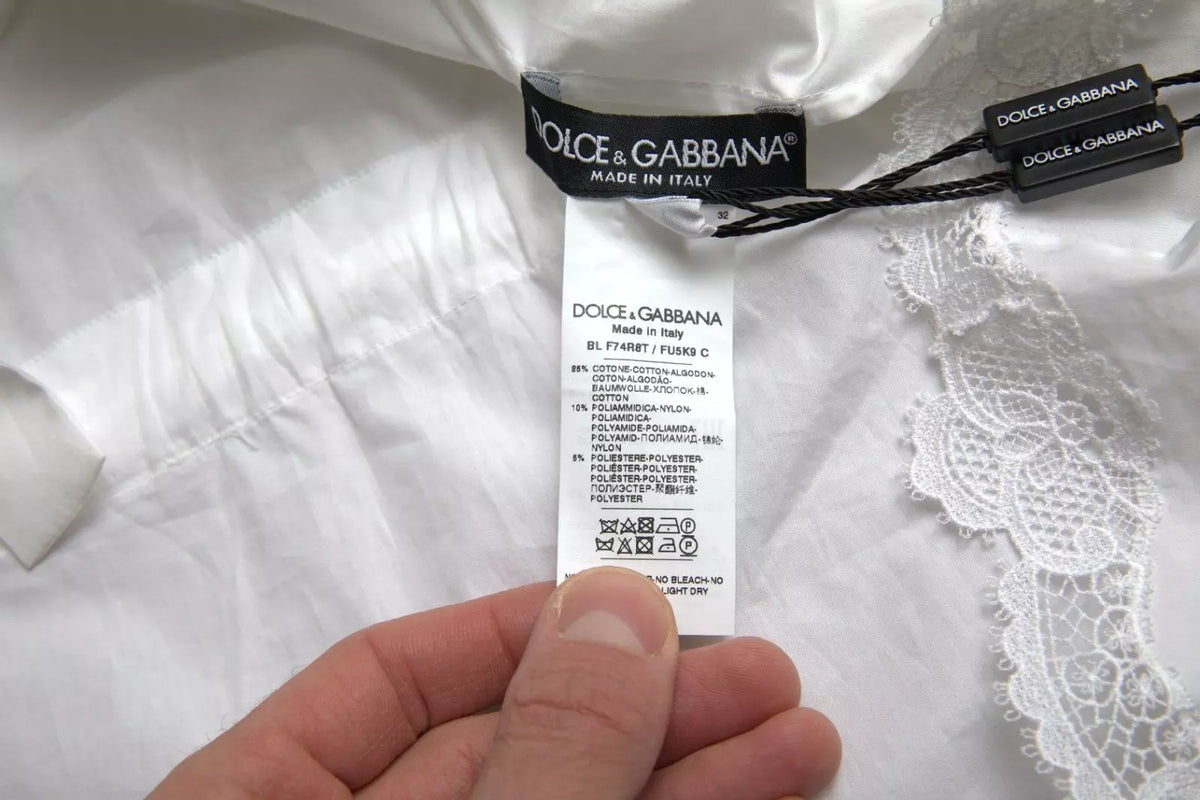 Chemisier à col roulé en coton blanc avec bordure en dentelle Dolce &amp; Gabbana