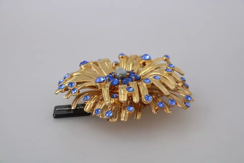 Broche de joyería adornado con cristales azules y latón dorado de Dolce &amp; Gabbana