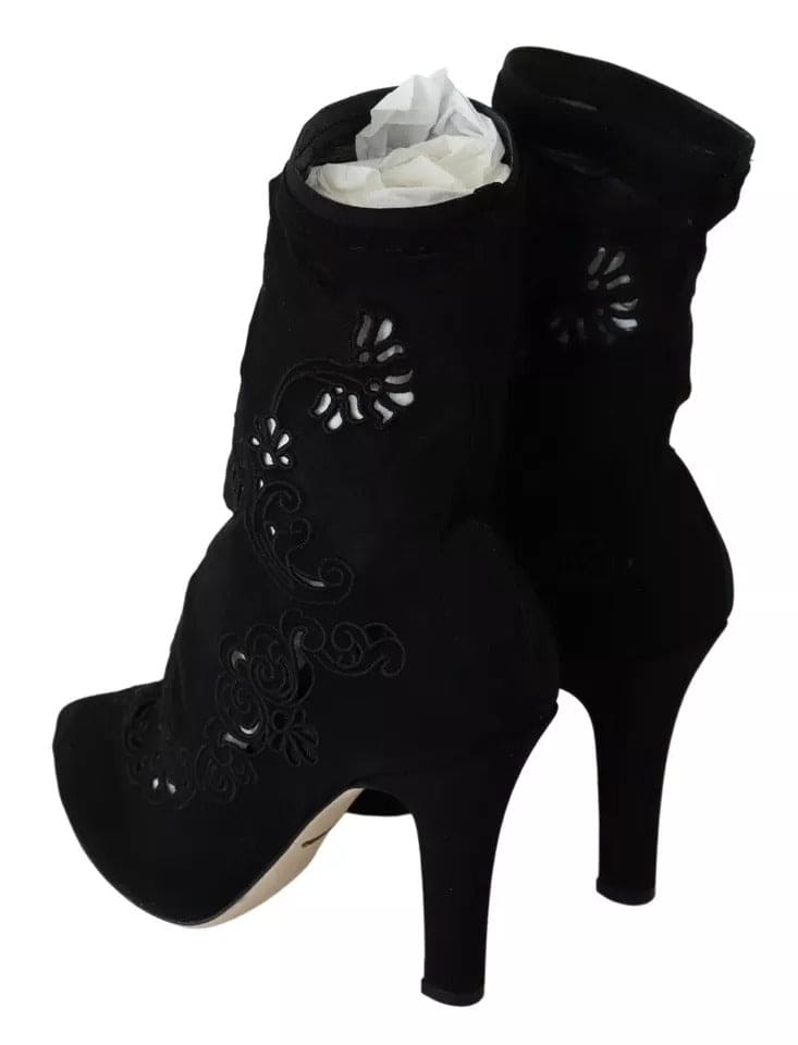 Botas negras con tacón elástico y encaje floral de Dolce &amp; Gabbana