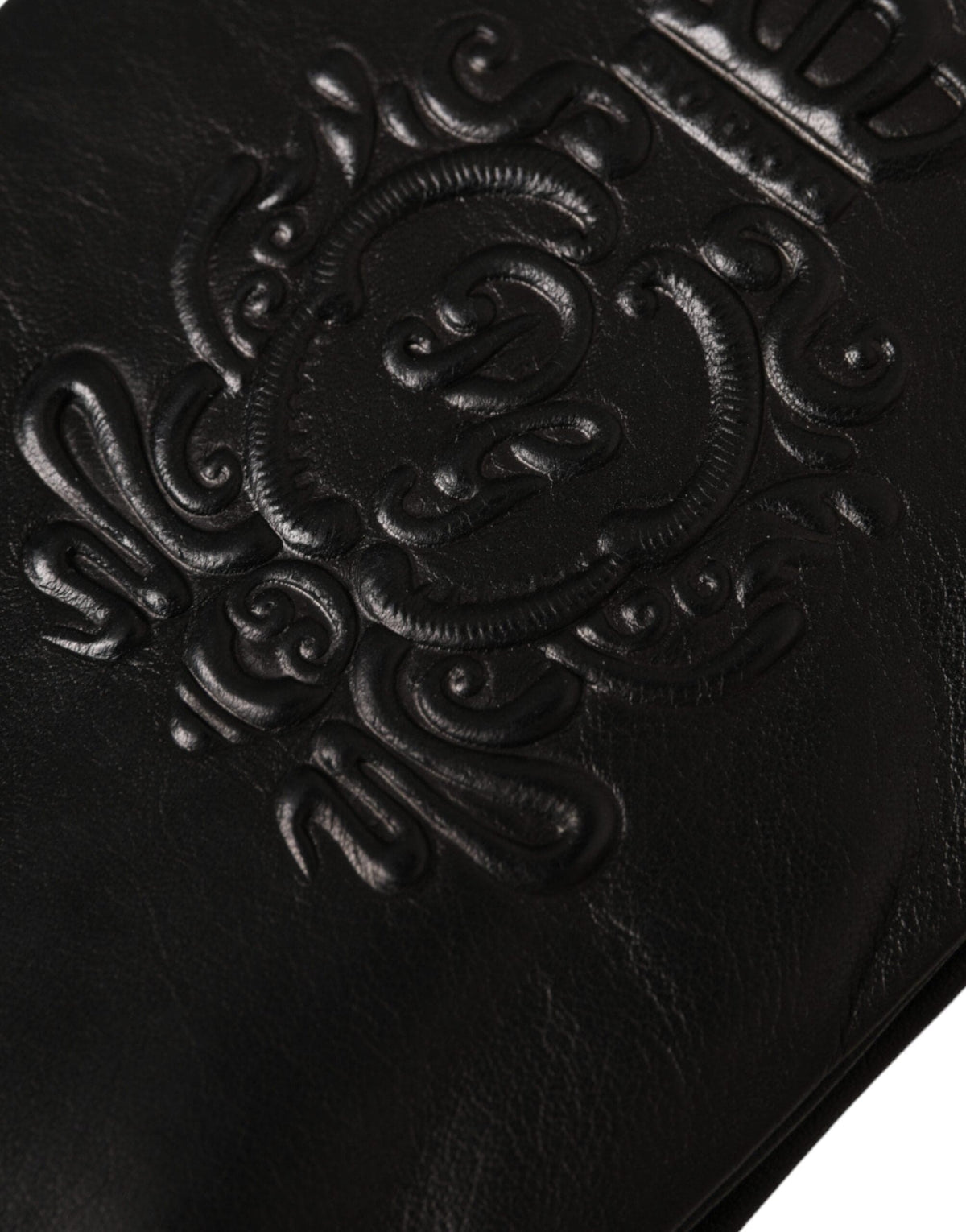 Guantes cortos de piel negra con logotipo en relieve de Dolce &amp; Gabbana