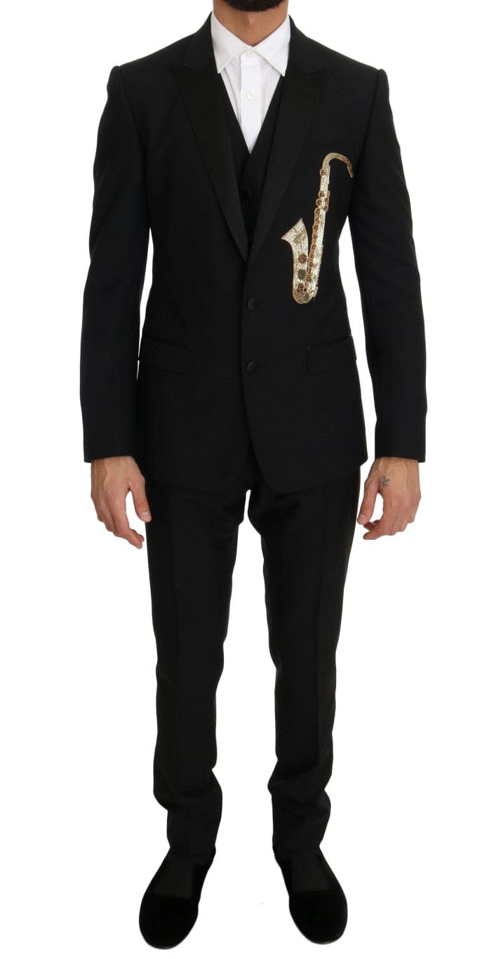 Elegante traje negro de tres piezas con bordado de saxofón de Dolce &amp; Gabbana