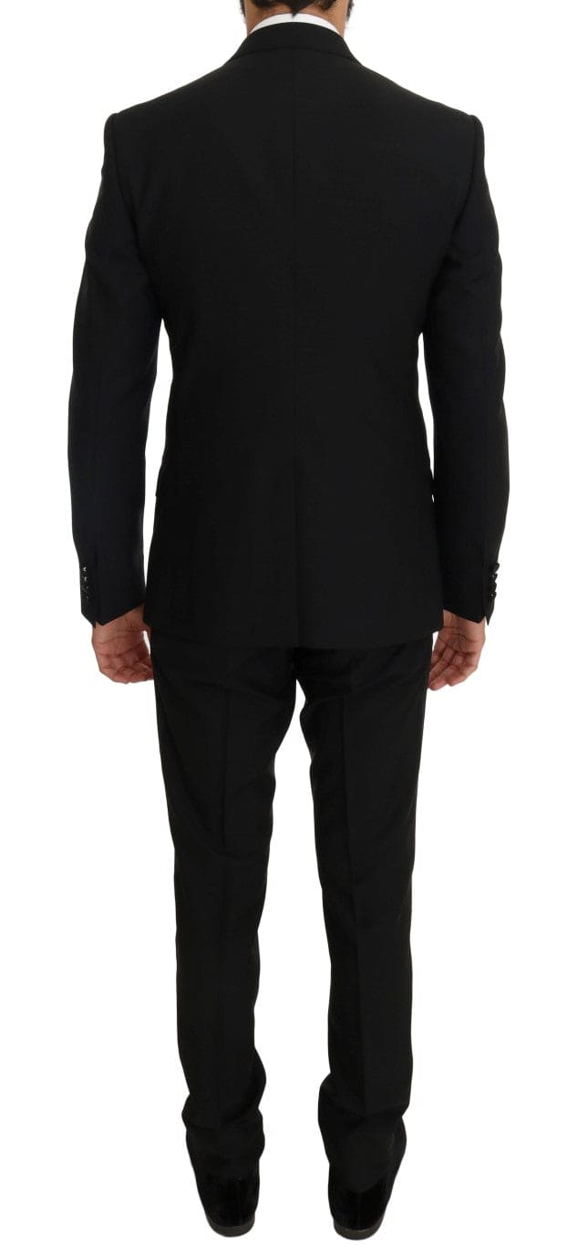 Elegante traje negro de tres piezas con bordado de saxofón de Dolce &amp; Gabbana