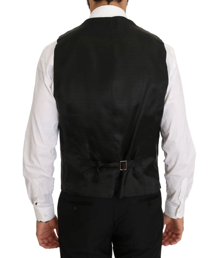 Elegante traje negro de tres piezas con bordado de saxofón de Dolce &amp; Gabbana