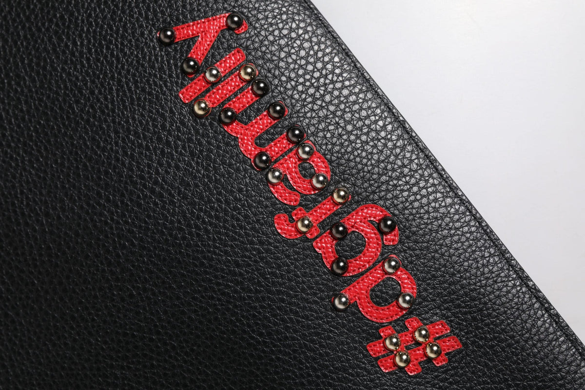 Pochette en cuir noir à ornements Dolce &amp; Gabbana #DGFamily