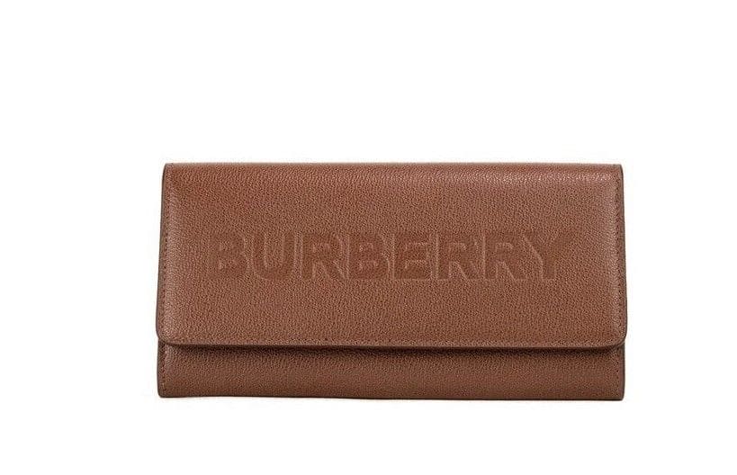 Cartera de mano con solapa y diseño continental en relieve de piel granulada color marrón Porter de Burberry